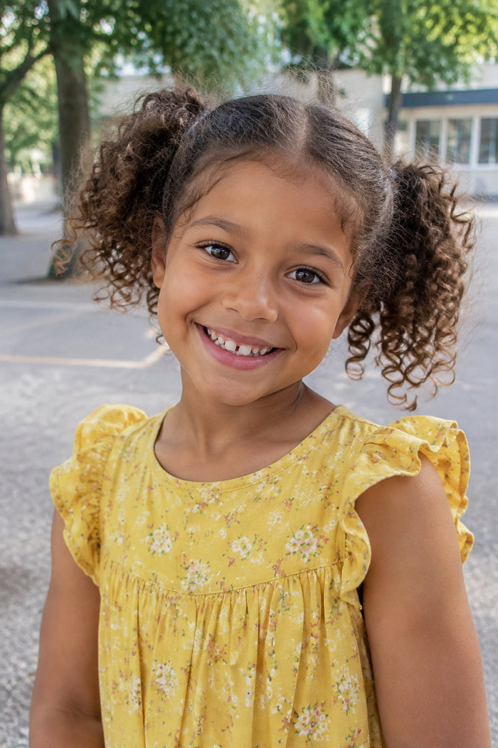Beispielbild: Ausgangsfoto einer fiktiven Person zum Anlass Einschulung